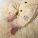 Eeley Knitted Jumpsuit - 3m to 12m - Angora Cream par MINI A TURE - Bodysuits, Rompers & One-piece suits | Jourès