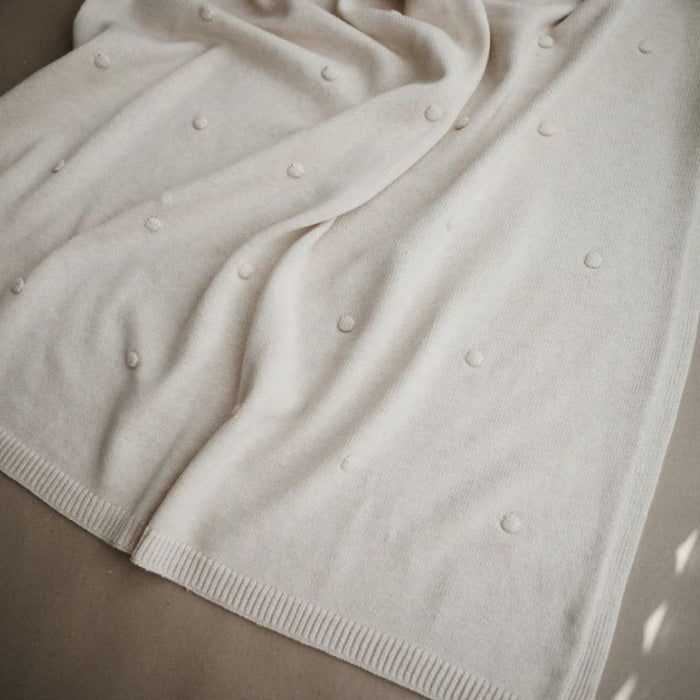 Couverture à pompoms en tricot - Blanc cassé par Mushie - Maison | Jourès