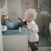 Kids Finger Toothbrush - Clay/Shifting Sand par Mushie - Press | Jourès