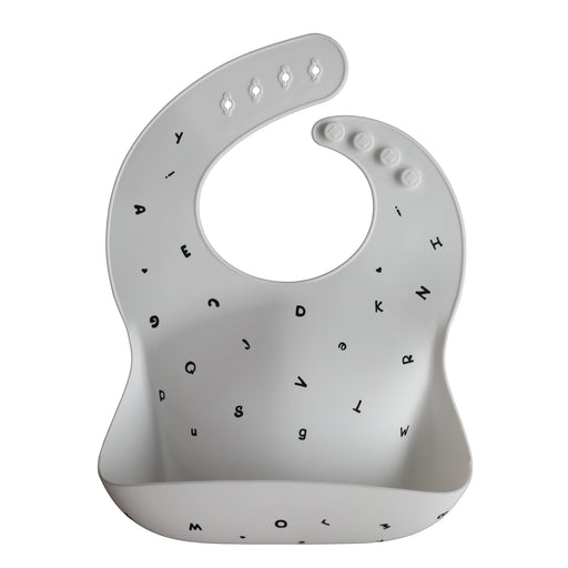 Adjustable waterproof silicone Baby Bib - Letters White par Mushie - Mealtime | Jourès